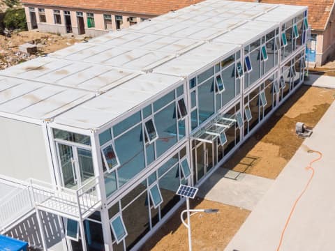 Glass container houses for resettlement