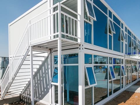 Resort-style stackable prefabricated duplex