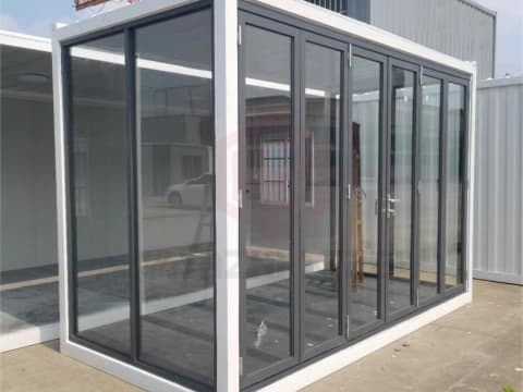 Steel-framed all-glass container house