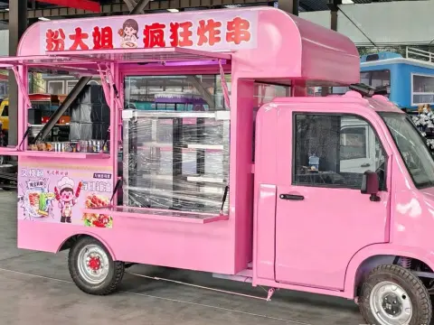 Pink food cart with customized display cases