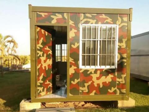 Camouflage X-shaped collapsible container house