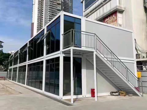 Multi-story modular container house with stairs